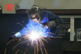 Welding the coal bunker trim strip